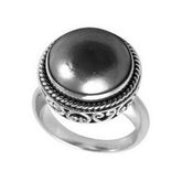 Sterling silver Grey Mabe Pearl ring with polished cabochon stone, twisted rope bezel, and artisan scrollwork, handcrafted in Bali.